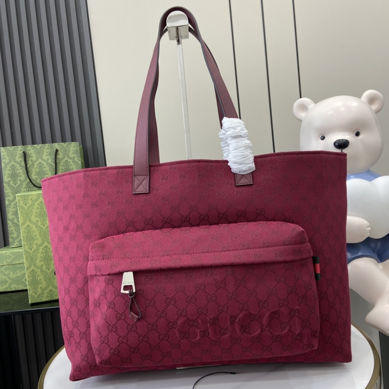 G*u*i shopping bags
